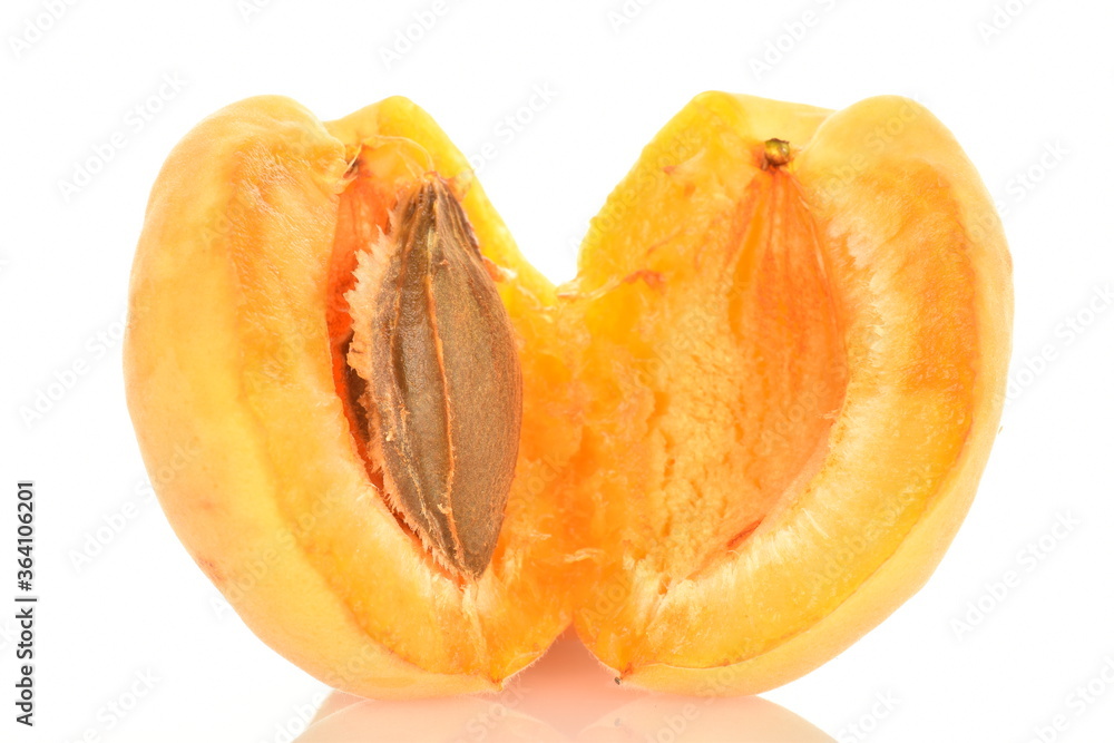 Ripe organic yellow apricot, close-up, isolated on white. Ripe organic yellow apricot, close-up, isolated on white.