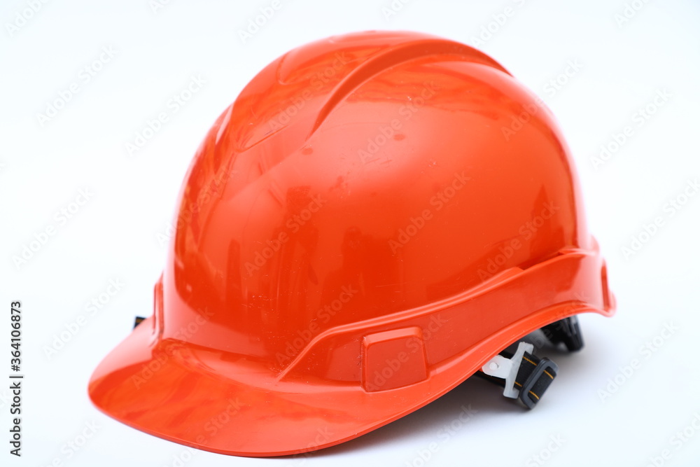 Red construction helmet shot isolated on white Red construction helmet shot isolated on white