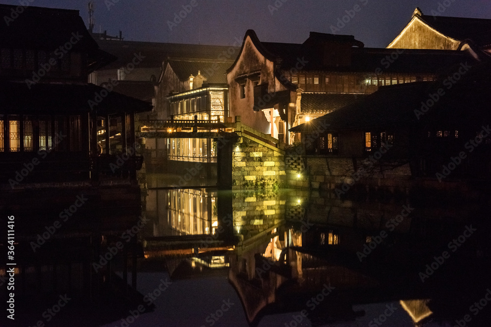 Wuzhen,Tongxiang city,Zhejiang province,Chine.01,21,2018. The night view of ancient town,Wuzhen, is a famous historical,cultural and traditional water town. Wuzhen,Tongxiang city,Zhejiang province,Chine.01,21,2018. The night view of ancient town,Wuzhen, is a famous historical,cultural and traditional water town.