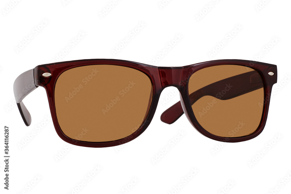 Sunglasses with a brown plastic frame and brown lenses isolated on white background.