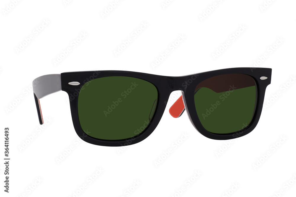 Sunglasses with a black plastic frame and green lenses isolated on white background.