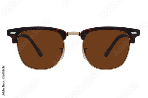 Sunglasses with a gold frame and brown lenses isolated on white background. photo