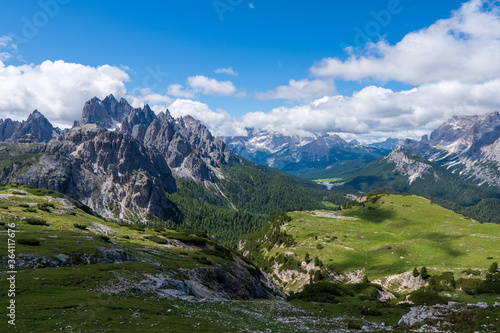 Fantastic views down the Dolomites mountain valley at the start of Tre Cime di Lavaredo loop hike in Parco Naturale Tre Cime, South Tyrol, Italy © Martin