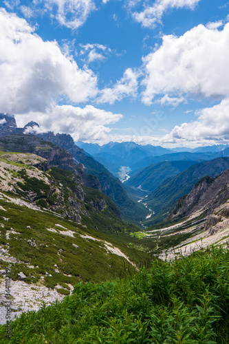 Fantastic views down the Dolomites mountain valley at the start of Tre Cime di Lavaredo loop hike in Parco Naturale Tre Cime, South Tyrol, Italy