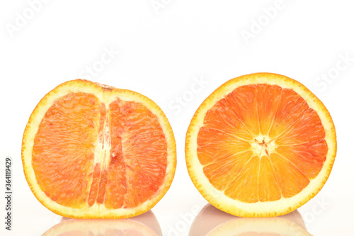 Juicy organic oranges  close-up  isolated on white.