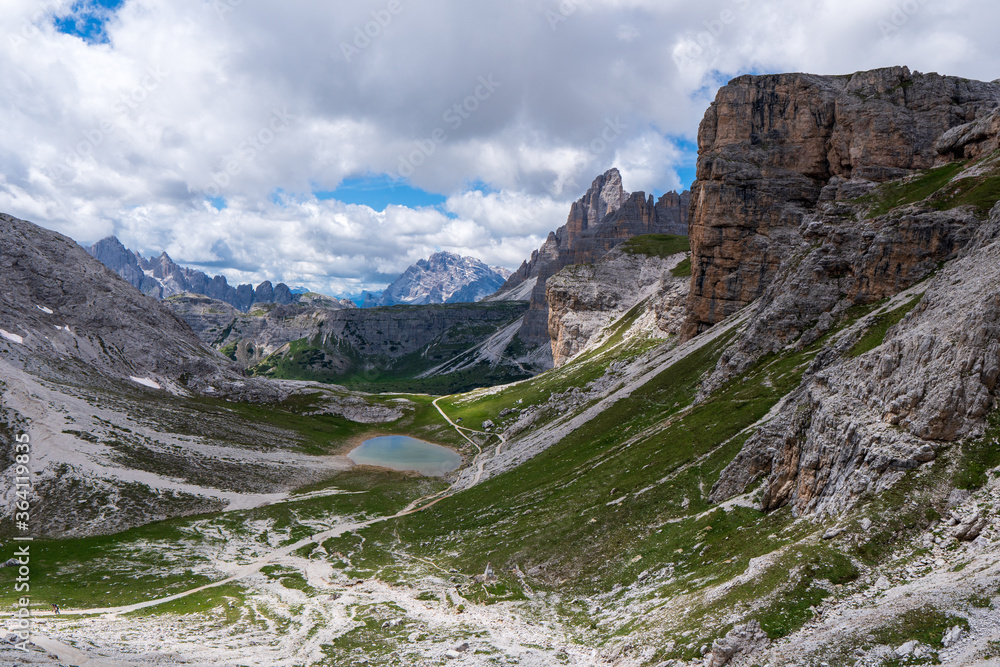 View of the Sesto (Sexten) Dolomites mountains as seen from the trekking trail to Pian di Cengia refuge cengia lake, Dolomites, South, Tirol, Italy.