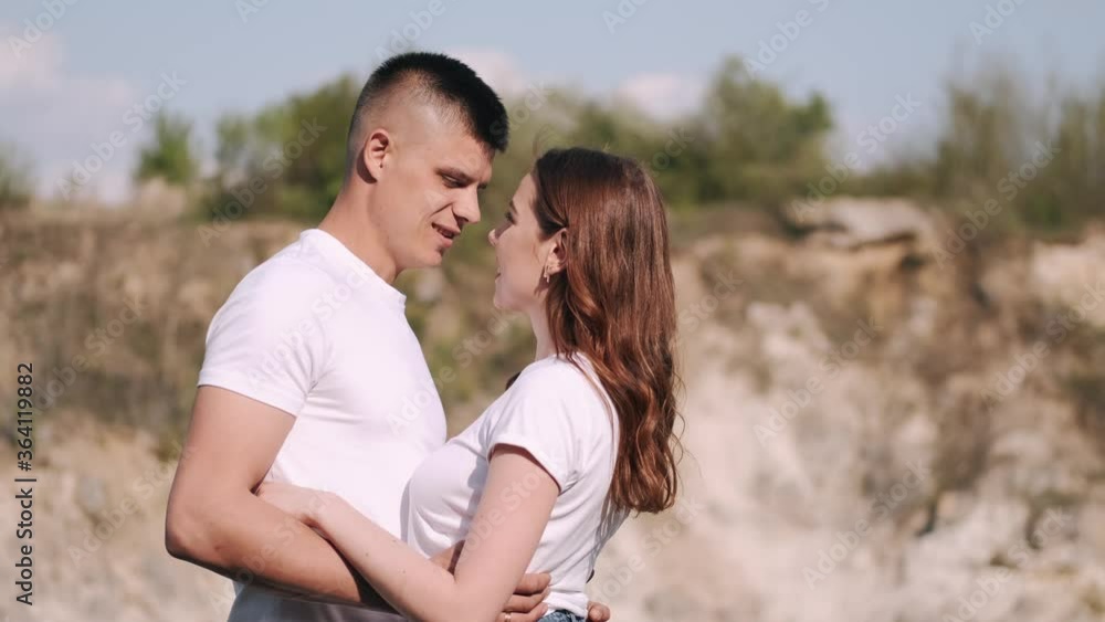 Man and woman hug each other. Couple is in career. Woman and man are on date. Man and woman hug each other. Couple is in career. Woman and man are on date.