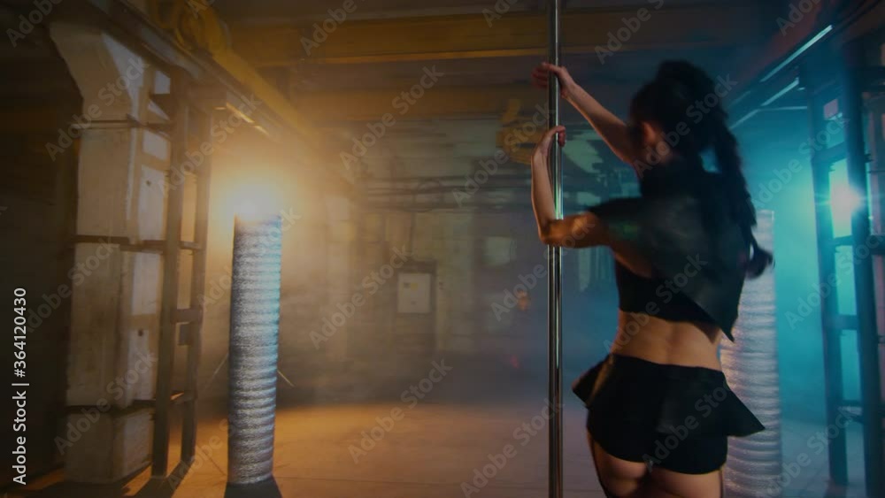 longlegged beautiful brunette in a black leather suit in the style of
cyber punk performs acrobatic elements on a pole,
post apocalypse. longlegged beautiful brunette in a black leather suit in the style of
cyber punk performs acrobatic elements on a pole,
post apocalypse.