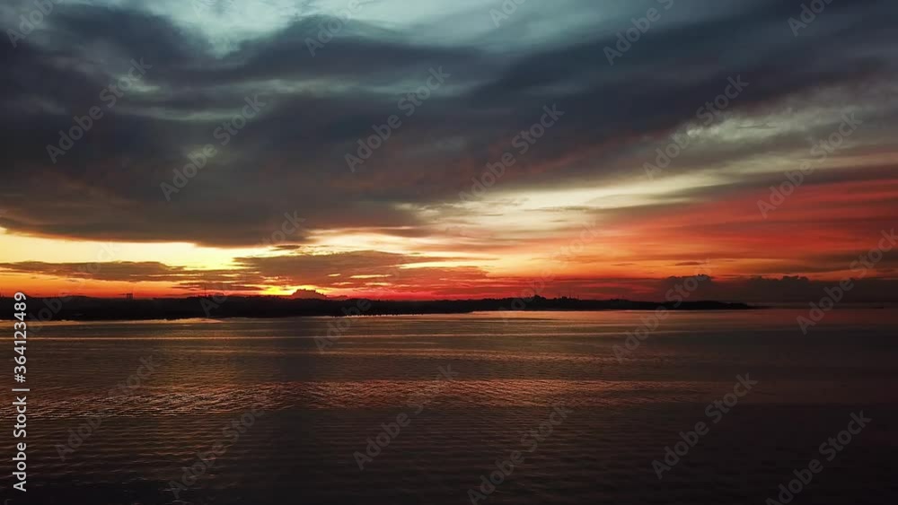 Aerial shot of sunset with sea Nongsa Batam Indonesia Aerial shot of sunset with sea Nongsa Batam Indonesia