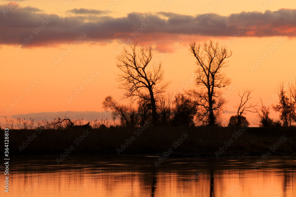 Colorful sunset by the Odra River, Poland. Colorful sunset by the Odra River, Poland.