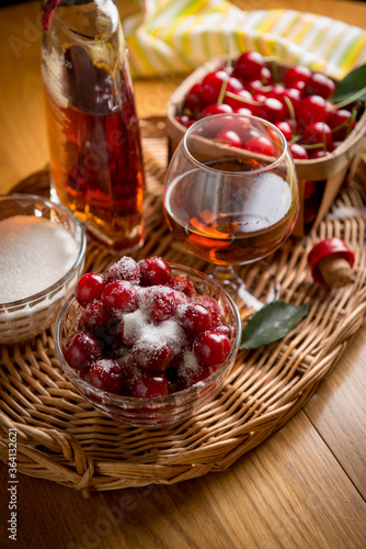 preparation of dessert, cherries in cognac