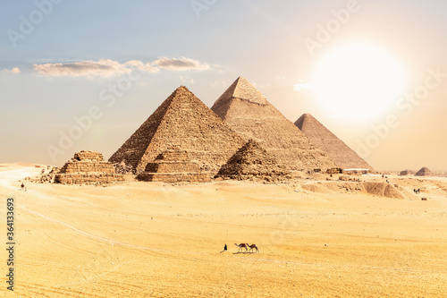 Great Pyramids of Giza under the desert sun, Cairo, Egypt