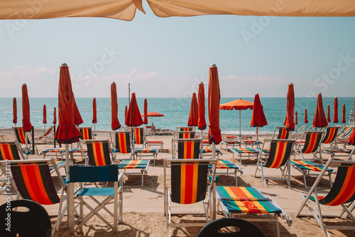 Beach equipped with sun beds and umbrellas