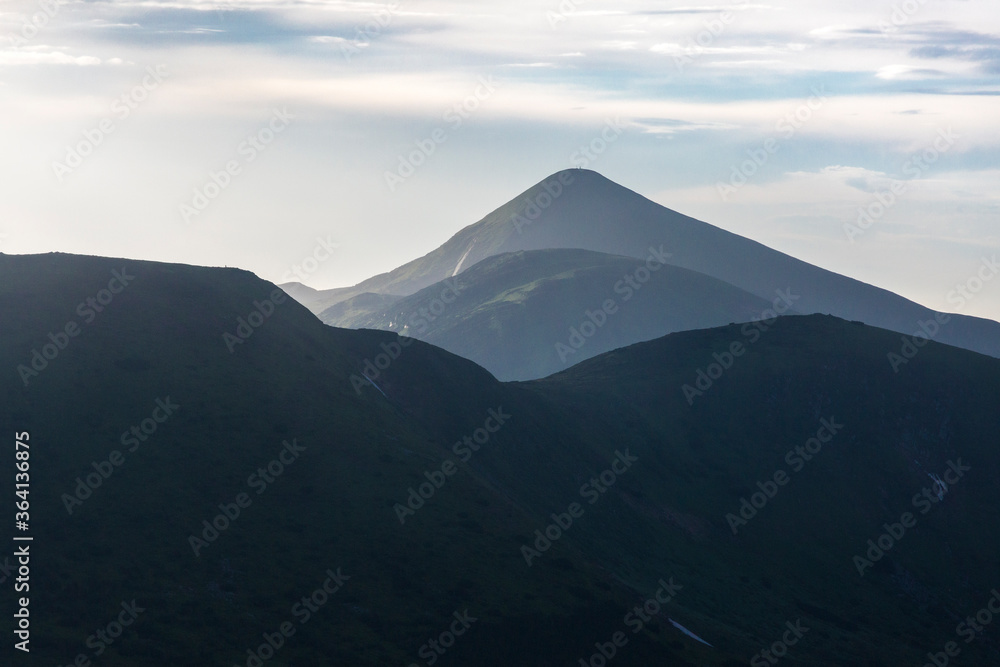 Summer landscape in the Carpathian mountains. View of the mountain peak Hoverla - is the highest mountain in Ukraine
