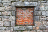 Stone castle wall and bricked old brick window vintage background