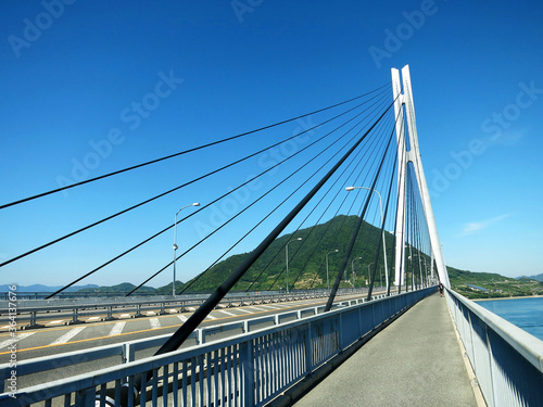 The cycle lane of Tatara Bridge (多々羅大橋, Tatara Ohashi) above Seto Inland Sea, JAPAN. A cable-stayed bridge as part of Shimanami Kaido expressway and cycling route
