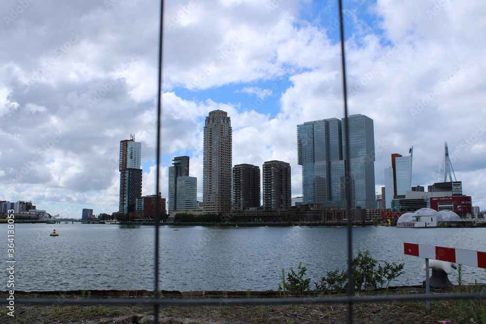 Rotterdam skyline through a fence, the Netherlands