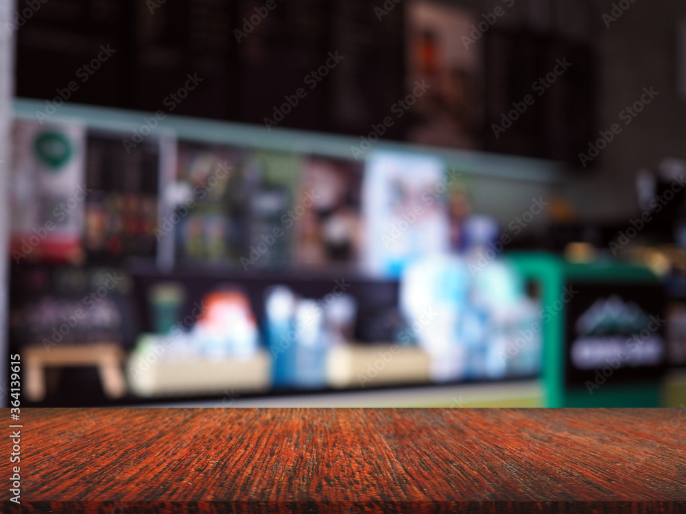 Product display with blank wood panels In a coffee shop with a blurred background. Suitable for showing your products on blank space. display mockup concept. Product display with blank wood panels In a coffee shop with a blurred background. Suitable for showing your products on blank space. display mockup concept.