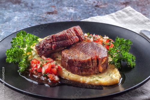 Beef medallions with tomato salsa and cream polenta