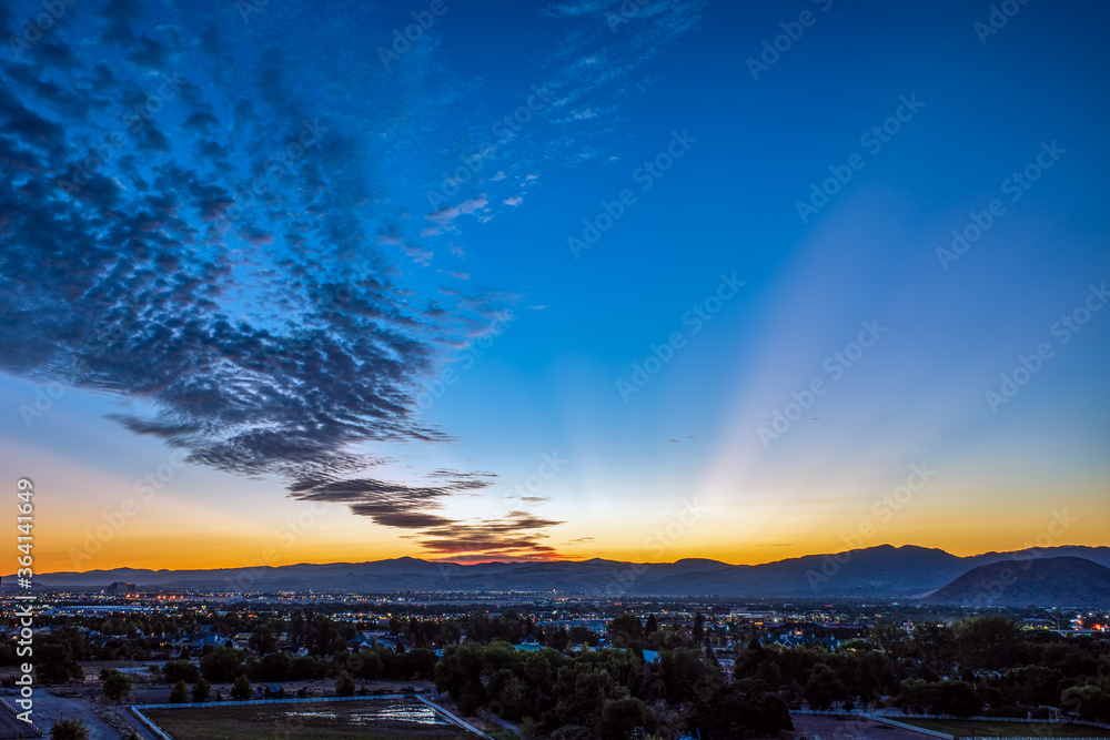 Reno Sparks Nevada urban area skyline at sunrise.