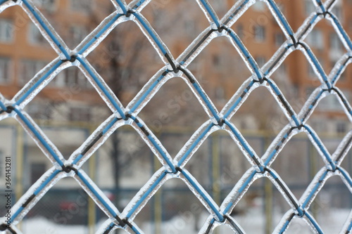the mesh fence is frozen