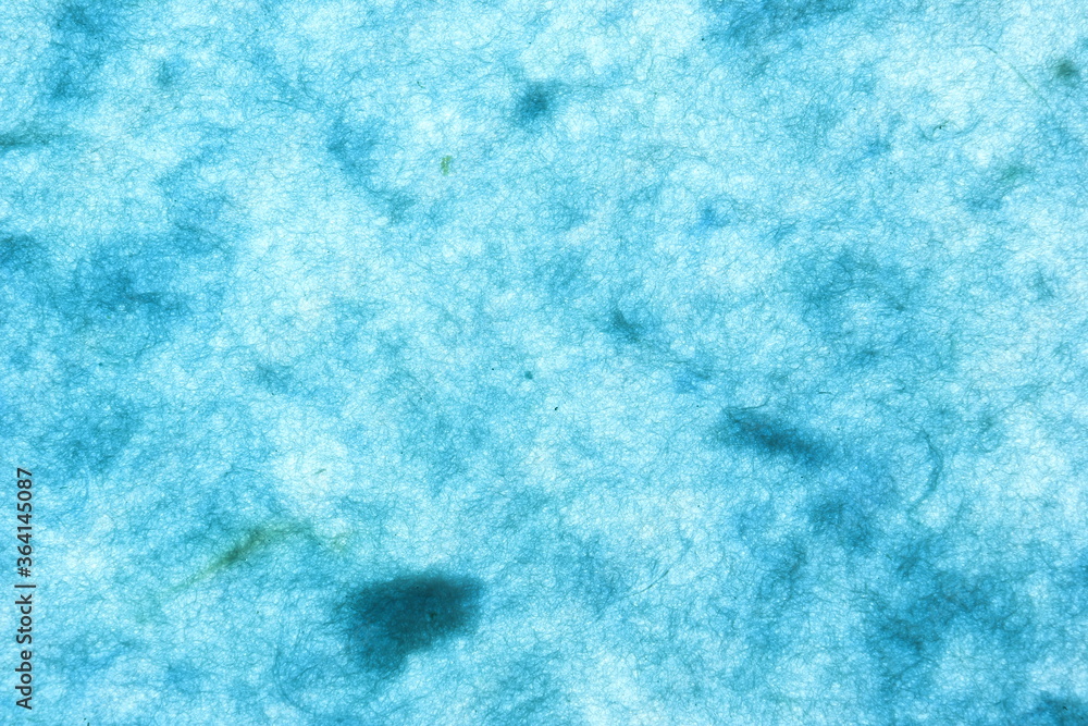 Hand made blue paper surface. Mulberry paper. Hand made blue paper surface. Mulberry paper.