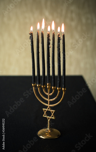 Menorah with dark candles, rituals and magical time
