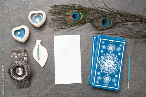 Canvas Print Blue tarot cards deck and blank tarot card with copy space on the stone table surface background