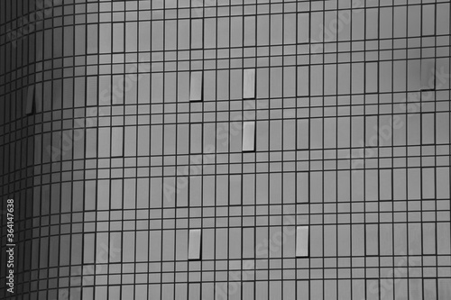black and white glass skyscraper windows  office building   modern business center