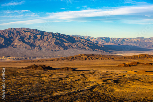 Mojave desert landscape with blue sky and clouds