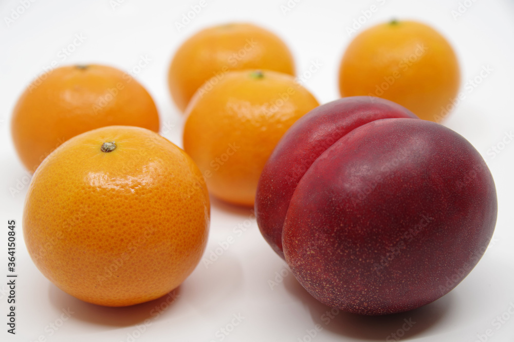 Nectarine and mandarins isolated on white background. Nectarine and mandarins isolated on white background.