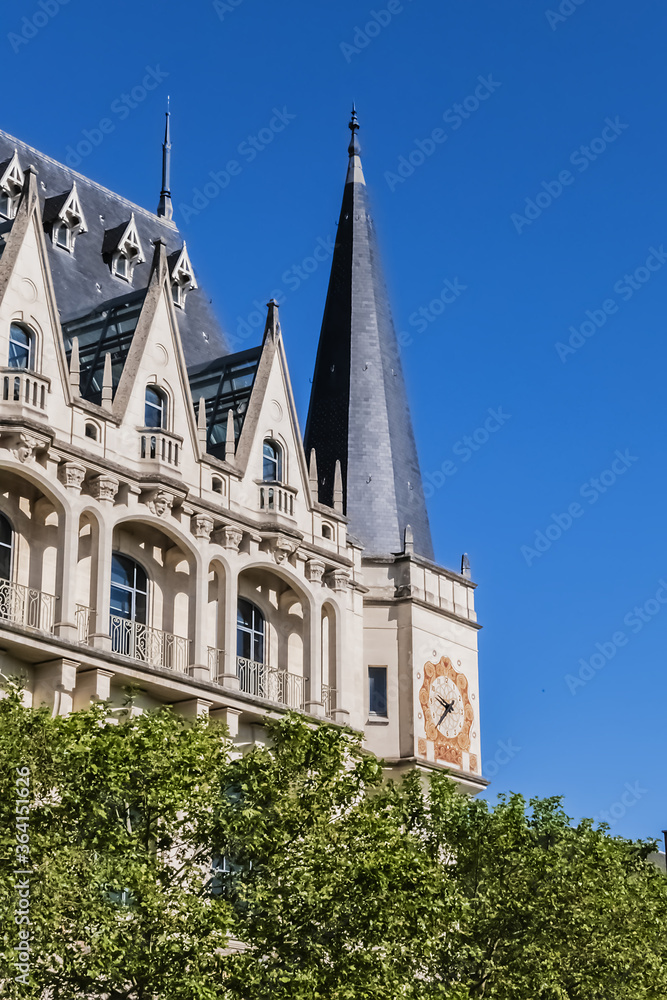 Obraz premium Architectural fragments of Chartres Neo-gothic style building at Boulevard Maurice Viollette. Chartres, Eure-et-Loir department, France.