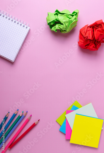 colourful stationary supplies on pink © Stacey
