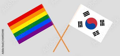 Crossed flags of LGBT and South Korea