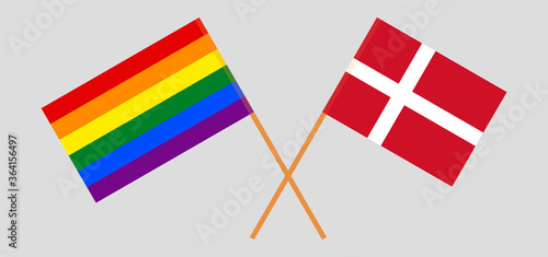 Crossed flags of LGBT and Denmark