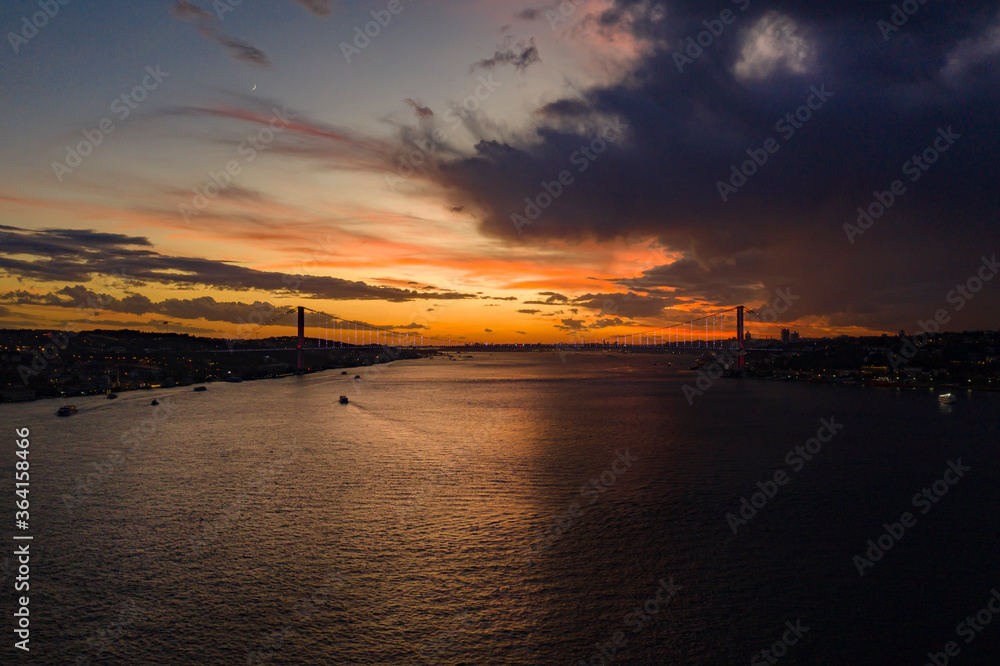 Istanbul Bosphorus panoramic photo. Istanbul landscape beautiful sunset with clouds Bosphorus Bridge, Fatih Sultan Mehmet Bridge Istanbul Turkey.Best touristic destination of Istanbul