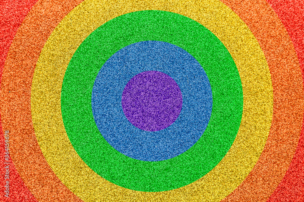 Fototapeta premium Rainbow circles on a texture surface