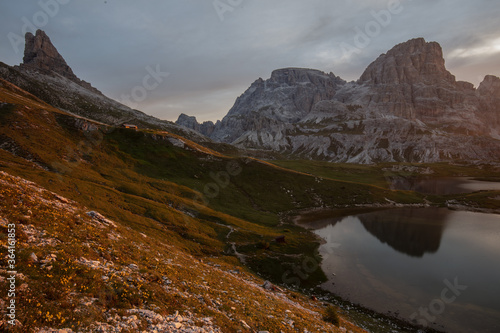 Sunrise on lake on tre cime di lavaredo Dolomites Italian alps