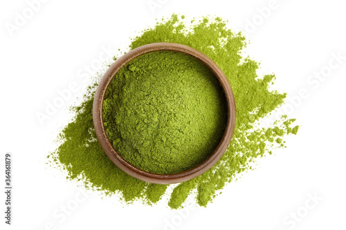 Принти на полотні Freeze dried young organic wheatgrass powder in wooden bowl isolated on white