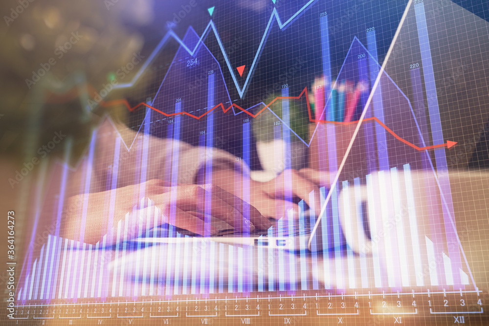 Double exposure of woman hands typing on computer and forex chart hologram drawing. Stock market invest concept. Double exposure of woman hands typing on computer and forex chart hologram drawing. Stock market invest concept.