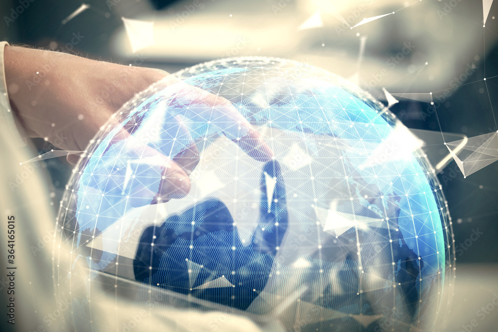 Double exposure of man's hands holding and using a phone and international business theme drawing. Double exposure of man's hands holding and using a phone and international business theme drawing.