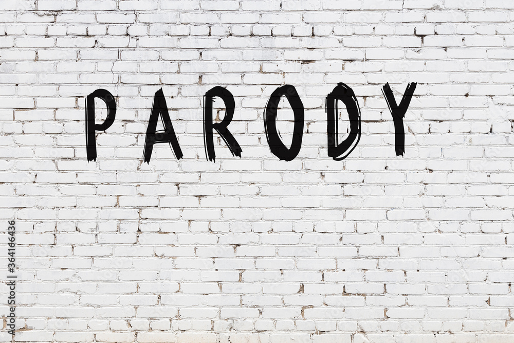 Ταπετσαρία White wall with black paint inscription parody on it