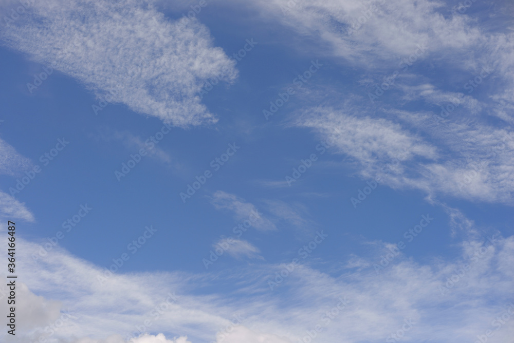 Blue sky and clouds, can be used as background.
