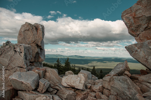 Beautiful landscape with a mountain range in nature and blue sky with white clouds photo