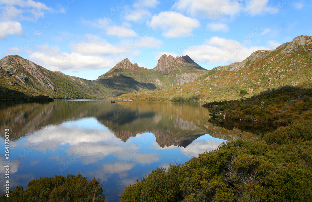 Beautiful Cradle Mountain National Park in Tasmania Australia featuring lake, forests and blue sky