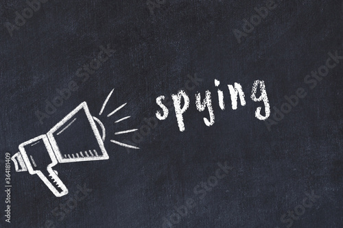 Chalk sketch of loudspeaker and inscription spying