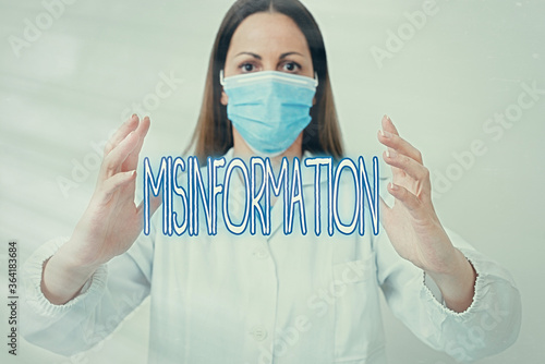 Text sign showing Misinformation. Business photo showcasing false data, in particular, intended intentionally to deceive Laboratory technician featuring empty sticker paper accessories smartphone photo