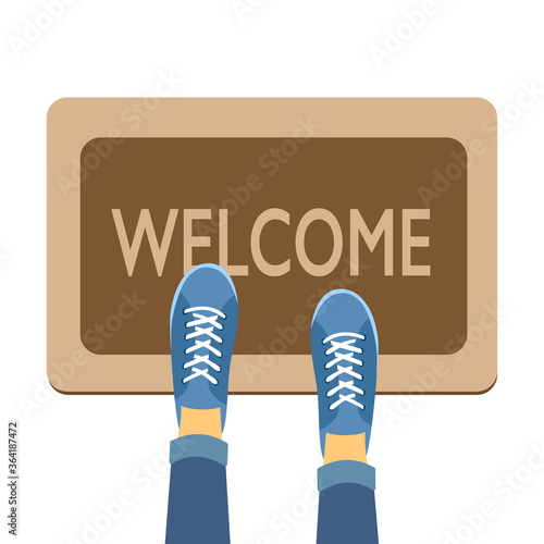 Welcome doormat with blue shoes in flat design concept vector illustration on white background. photo