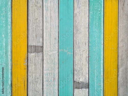 The surface and color of the old wooden fence.