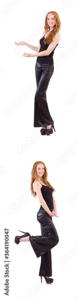 Redhead woman in black bell bottom pants on white Redhead woman in black bell bottom pants on white